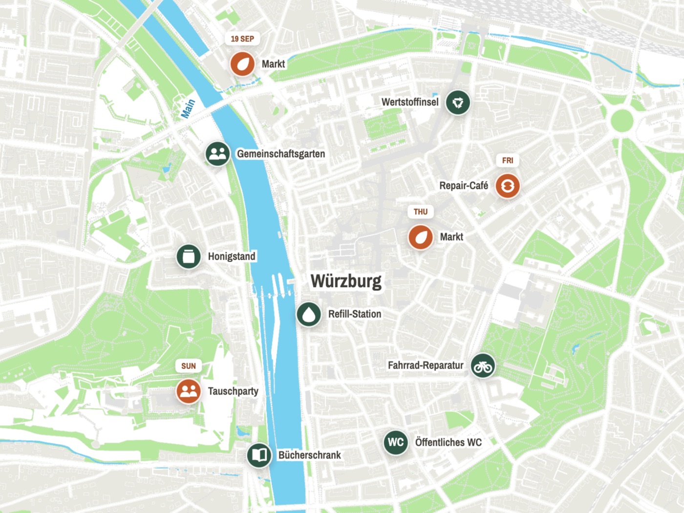 Map of central Würzburg with community pins for markets, a repair café, a refill point and a book box